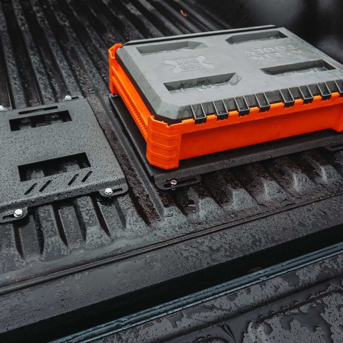 Metal Mounting Plates show product design in the bed of a truck
