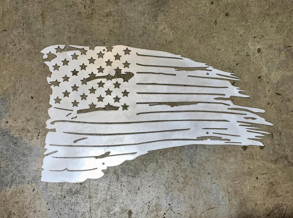 steel cutout of a tattered American flag 