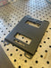 image of a powdercoated mounting plate for Klein Modbox sitting on a table