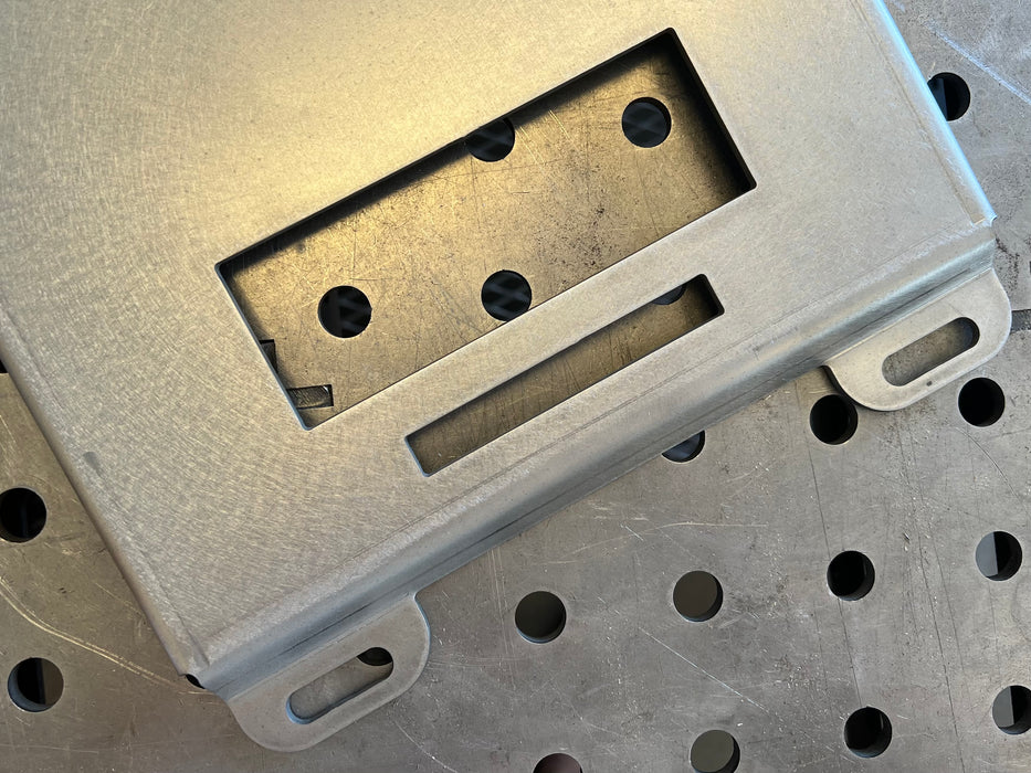 image of close up of one side of klein modbox mounting plate