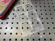 Metal cutting template on a perforated metal surface