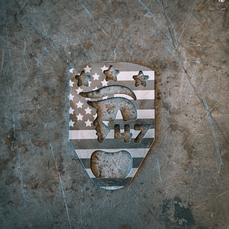 metal bottle opener with cutout of president trump and the number 47