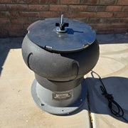 Heavy duty 12-gauge steel replacement lid sitting on 18lb central machinery tumbler