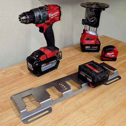 Milwaukee power drill and accessories on a wooden surface