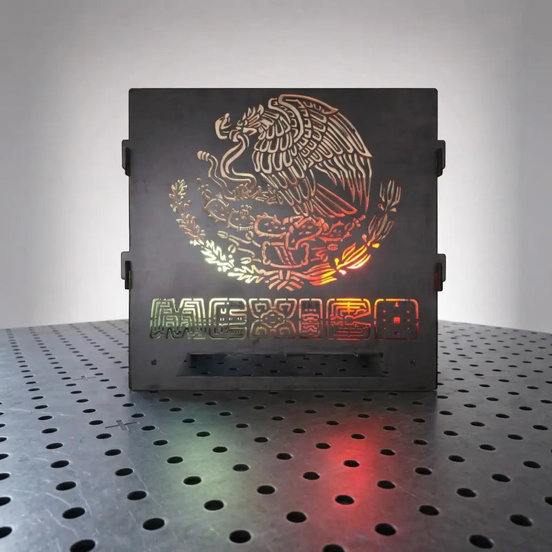 image of dxf file cut into 10ga steel firepit, graphic is mexico coat of arms
