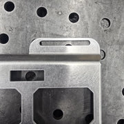 Close-up of imperfect mounting hole on clearance aluminum top row mount