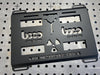 mounting plate for klein, powdercoat black with risk of electric shock text cut-out design