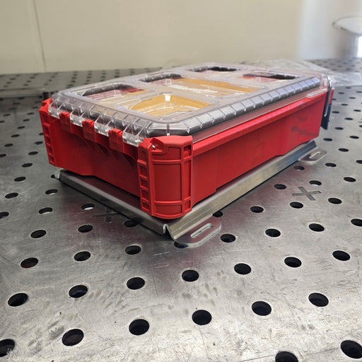 Milwaukee Packout organizer box clicked into a BOCO Custom aluminum mounting plate, showing secure fit.