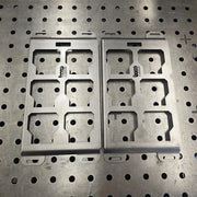 Two raw 10-gauge steel half width Packout mounting plates with BOCO Custom logo