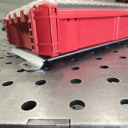 Packout organizer resting on the unbent edge of a B-Grade mounting plate
