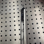 Side view of the bent edge on a 10-gauge raw steel Packout mounting plate