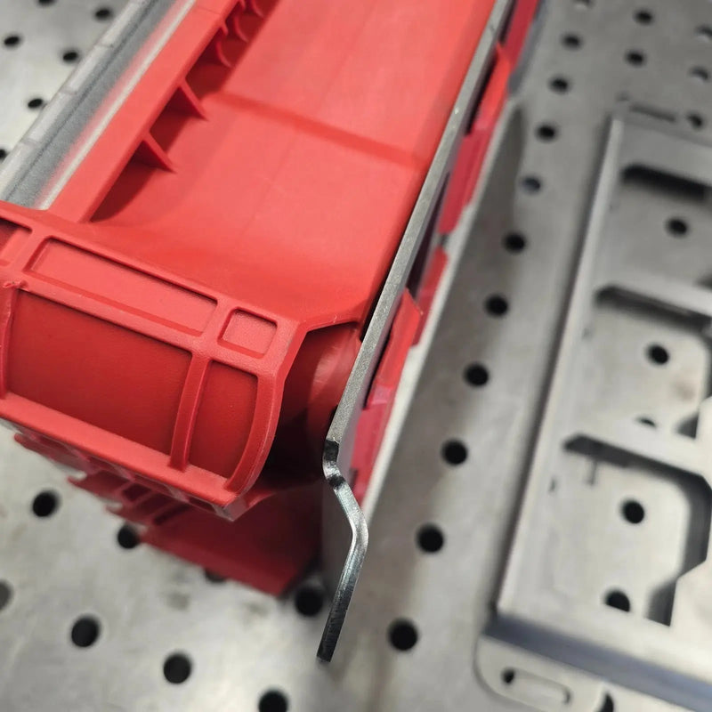 Milwaukee Packout organizer seated on the bent edge of a half width mounting plate
